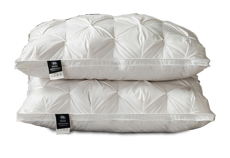 A Pair Of Feather Pillows And White Goose Single Neck Guards