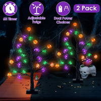 Two lighted black Halloween tabletop trees