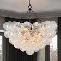 Bubble Glass Chandelier, 9-Light Ribbed Globe Shade, Black and Clear, 32"
