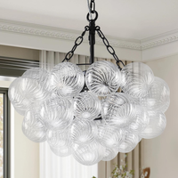 Bubble Glass Chandelier, 9-Light Ribbed Globe Shade, Black and Clear, 32"