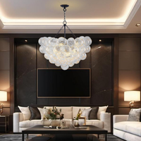 Bubble Glass Chandelier, 9-Light Ribbed Globe Shade, Black and Clear, 32"